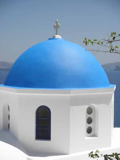 "Blue domed church steeple in Santorini"