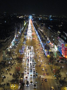 "View from the Arc de Triomphe at night"