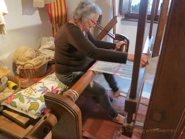 "Seamtress Guiliana in Portico di Romagna working on her weaving loom"