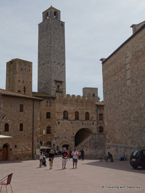 Torre Rognosa rising above the Palazzo Comunale on Piazza del Duomo with Torre Chigi, the lower tower on its left