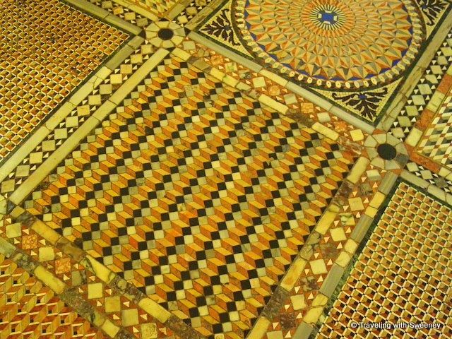 Geometric patterns on a section of mosaic marble floor in the basilica