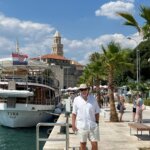 Mr. TWS of Traveling with Sweeney walking along the port of Split, Croatia on a Viking Mediterranean Odyssey cruise